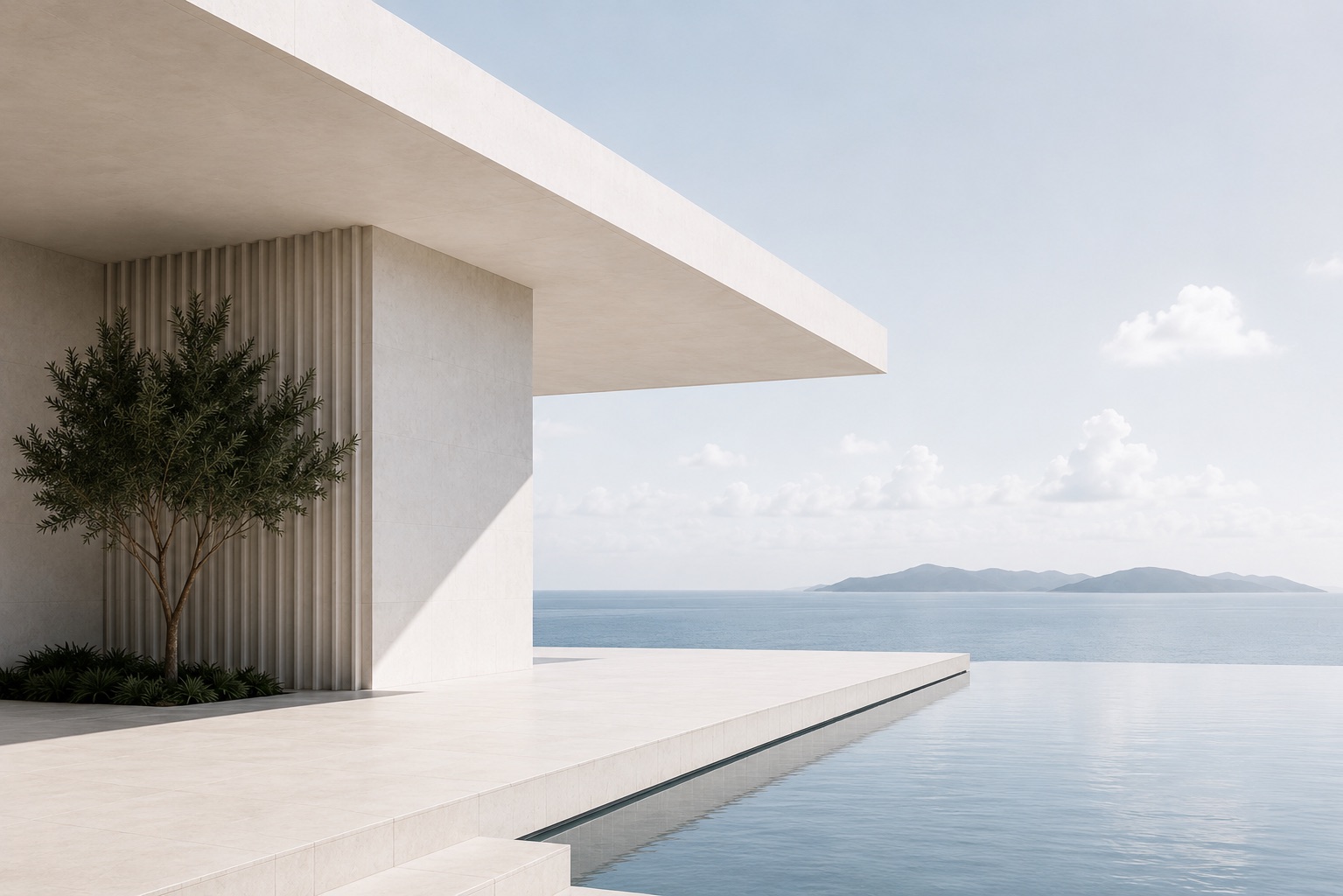 White modern pool terrace overlooking the U.S. Virgin Islands